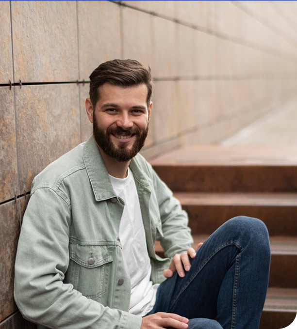 man-sitting-comfortably-on-stairs
